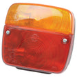 A close-up image of the Halogen Rear Combination Light 12V, RH & LH - S.12063 by Sparex, featuring a rectangular tail light with an amber lens on top and a red lens on the bottom, secured by two screws. The IP65-rated design ensures durability, making it perfect for various conditions.
