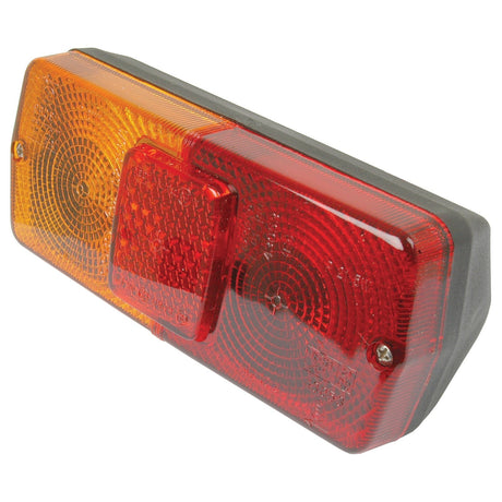 The Sparex Rear Combination Light (Halogen) model S.42187 features an amber section on the left, red sections on the right, a smaller central red reflector, and two screws for attachment. Equipped with halogen bulbs, this 12V light enhances visibility and safety as both a brake light and signal indicator.