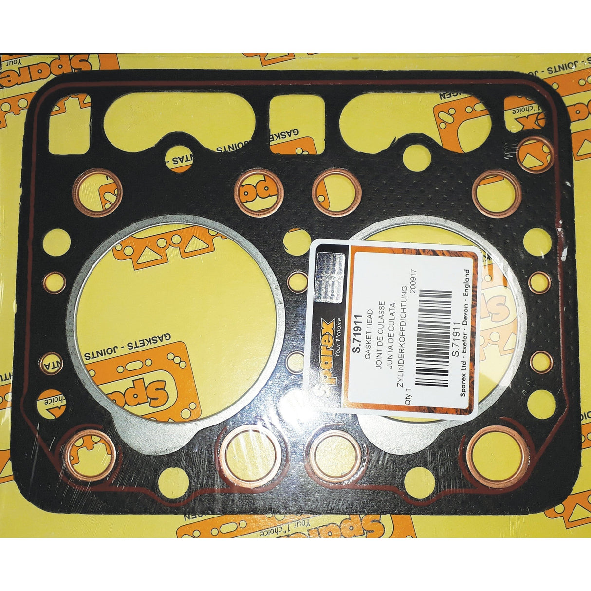 A rectangular engine head gasket with multiple holes, including large circular ones, packaged on yellow paper branded with Scooters; a white label bearing a barcode and product information is affixed to the packaging. Ideal for the Kubota B7000, this Sparex component (Head Gasket - 2 Cyl., Sparex Part No. S.71911) ensures precision and reliability.