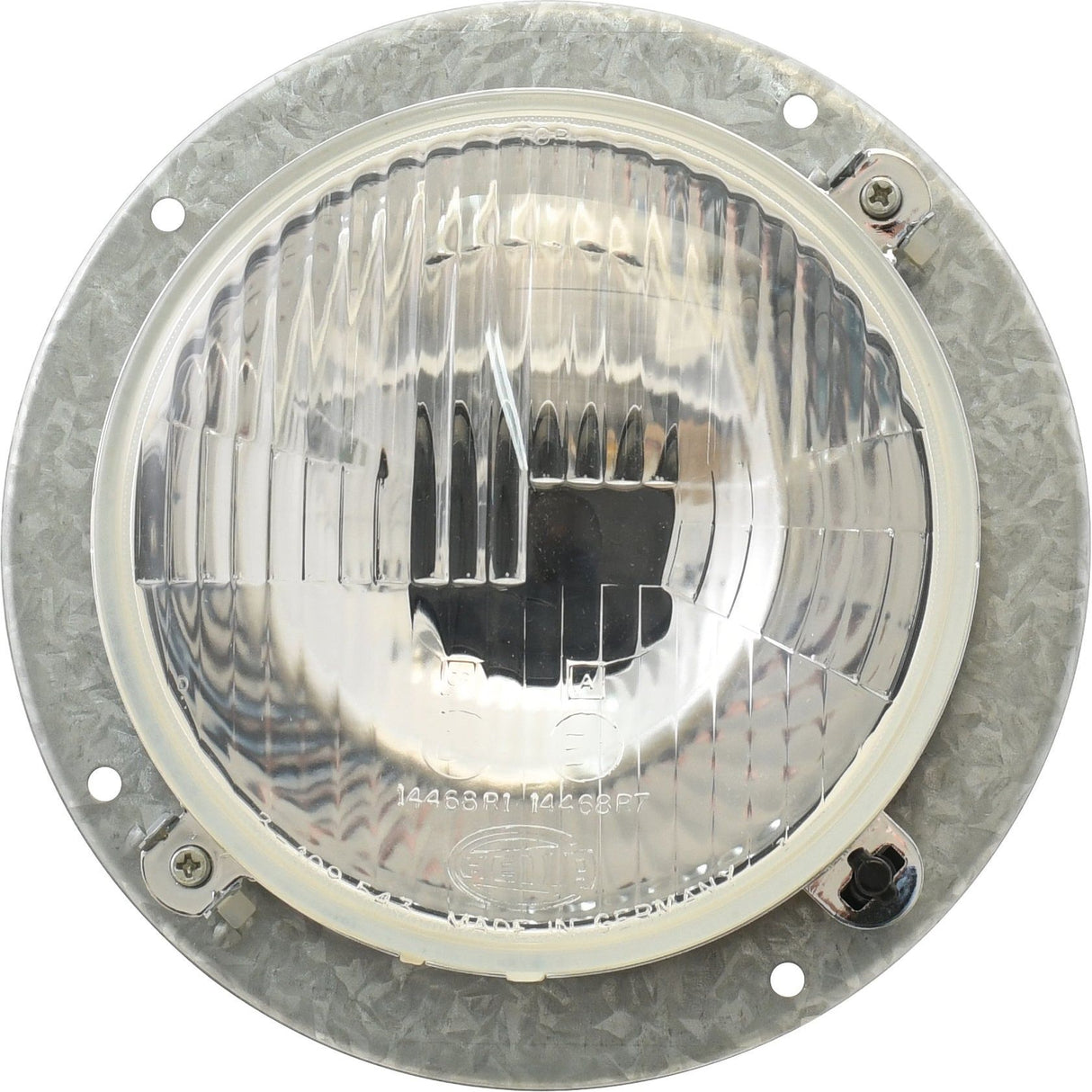 Close-up of a round, clear Sparex Head Light (Halogen) - S.75956 with a metal frame and three screws securing it in place. The surface has a textured finish, perfect for panel mount applications.