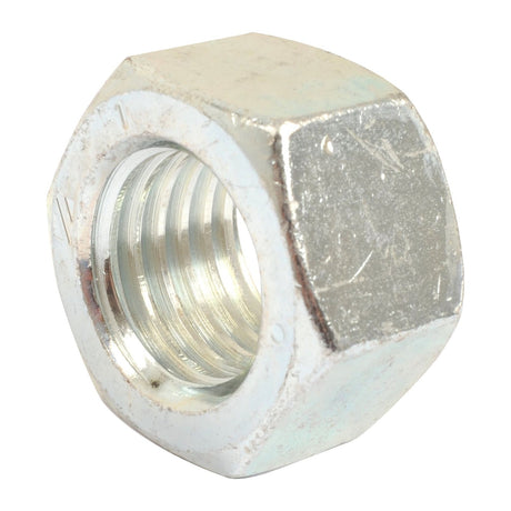 Close-up of a Sparex Imperial Hexagon Nut, Size 1'' UNC (DIN 934), displaying internal threading and a slightly weathered surface with tensile strength rating of 8.8.