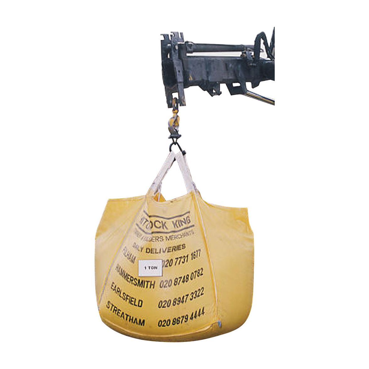 A yellow 1-ton bulk bag is suspended from a mechanical lifting device, displaying contact information for Stock King Builders Merchants and showcasing their Permanent Repair Solution, J-B Adhesive Weld - S.14553 by Sparex.