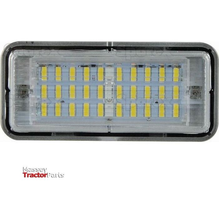 The John Deere LED Work Light by Sparex features a rectangular module with multiple yellow LED chips arranged in rows and encased in a transparent cover. The term "Massey Tractor Parts" is visible in red and black text at the bottom left corner. This work light offers 3500 lumens and is rated IP69K for durability. Its interference class is Class 3, suitable for voltage ranges between 10-30V (Product Code: S.149216).