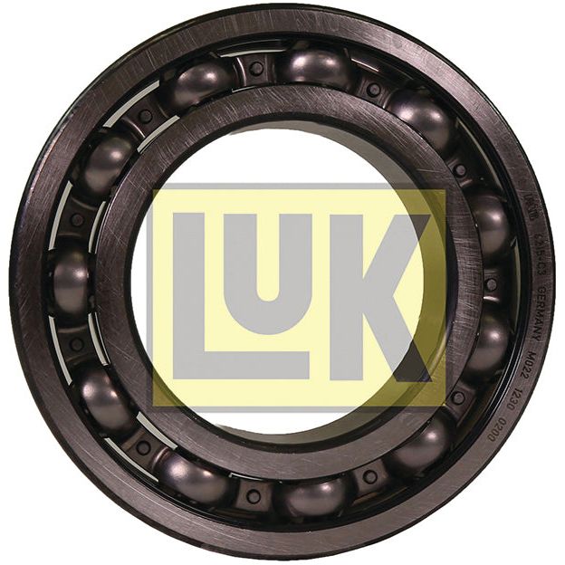 A LUK Clutch Release Bearing - S.146408 featuring visible metal balls arranged in a circular track, with a background showcasing the yellow and black logo of Sparex highlighted by the text "LUK.