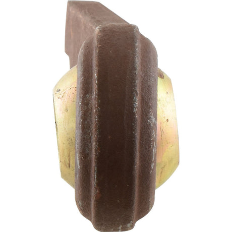 Close-up view of a rusty metal machine part featuring a cylindrical, brass-colored component in the middle, identified as *SPECIAL PRICE* - Lower Link Weld On Ball End (Cat. 2) RH | Sparex Part No.S.60025 from JMCE DEALS, possibly from a Massey Ferguson tractor.