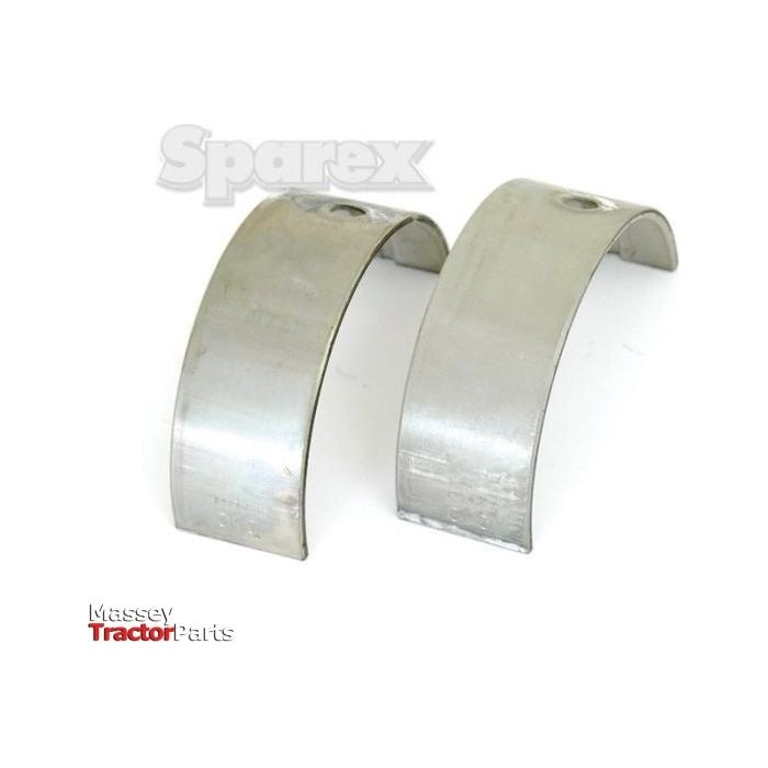 Two upright metallic bearing shells with stamped details are visible against a white background, displaying the text "Sparex." The phrase "Massey Tractor Parts" is shown in the lower-left corner. These Main Bearing +0.010'' (0.25mm) pairs (Sparex Part No.S.20802) are compatible with both Massey and John Deere tractors.