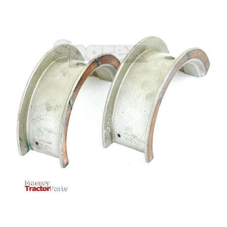 Two metal tractor engine bearings, clearly marked +0.020'' (0.50mm), with a "Sparex" watermark and a Massey Tractor Parts logo in the corner. The product is named Main Bearing +0.020'' (0.50mm) (Pair), Sparex Part No.S.20943 from the Sparex brand.