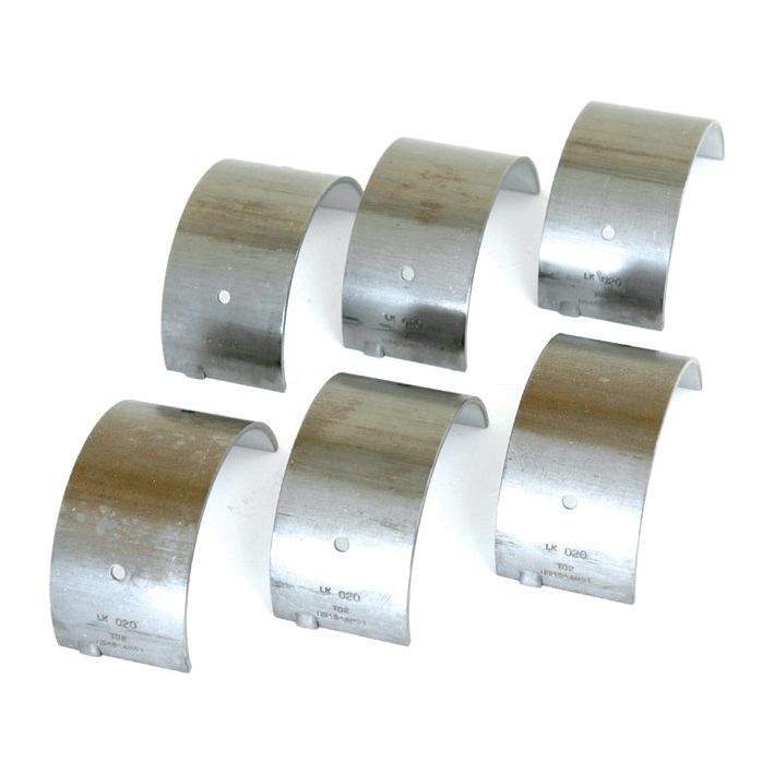 Six Sparex Main Bearings +0.020'' (0.50mm) (Set) with a single hole, arranged in two rows of three on a white background. Ideal for Massey Ferguson and Landini machinery maintenance, Sparex Part No.S.42369.