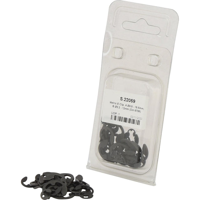 Plastic packaging containing small black Metric E Clips, with several clips scattered outside the package. The label reads "Sparex Part No.S.22059" and includes additional specifications such as DIN 6799 compliance, specifically identifying the product as "Metric E Clip, A Ø4.5 - 15.5mm, B Ø3.2 - 12mm (Agripak 36 pcs.).