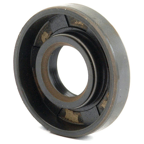 Close-up image of the Sparex Metric Rotary Shaft Seal, 15 x 35 x 7mm Double Lip (Sparex Part No.S.50165), featuring a circular rubber design with a metal spring, used in machinery to prevent leakage of lubricants. This high-performance seal includes a double lip design for enhanced efficiency.