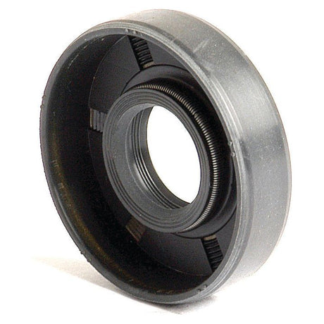 A close-up view of the Sparex Metric Rotary Shaft Seal, measuring 16 x 40 x 10mm, that features a circular metal casing with an inner rubber ring and spring.