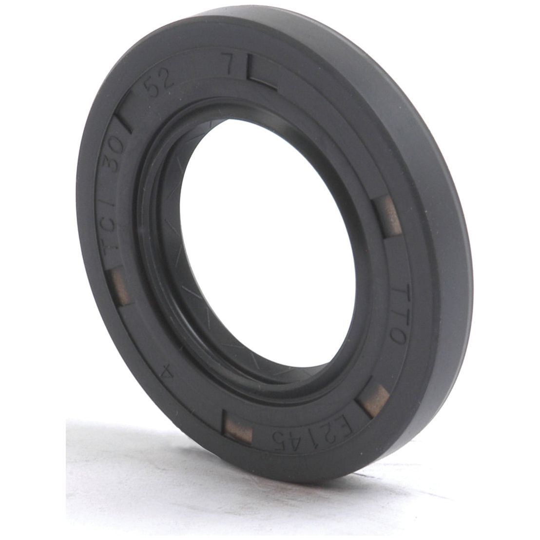 A black rubber oil seal with visible engravings including "TC," "30," "52," "TTO," and other alphanumeric markings, identified as the Sparex Metric Rotary Shaft Seal (Sparex Part No.S.50243), featuring a double lip design and dimensions of 30 x 52 x 7mm.