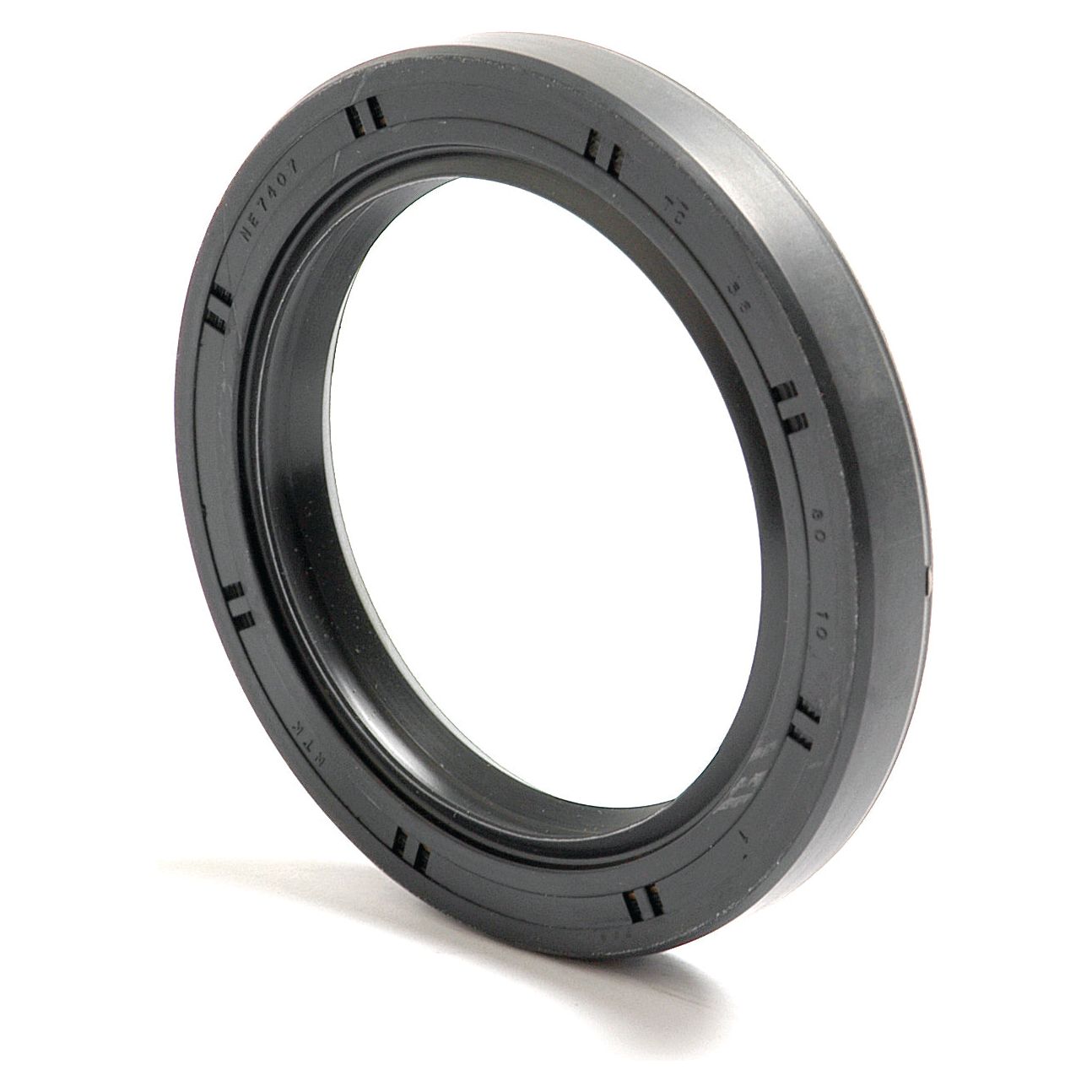 Close-up of a Sparex Metric Rotary Shaft Seal, 58 x 80 x 10mm Double Lip with ridged exterior edges, used for sealing mechanical parts to prevent leaks. This essential component helps maintain system integrity.