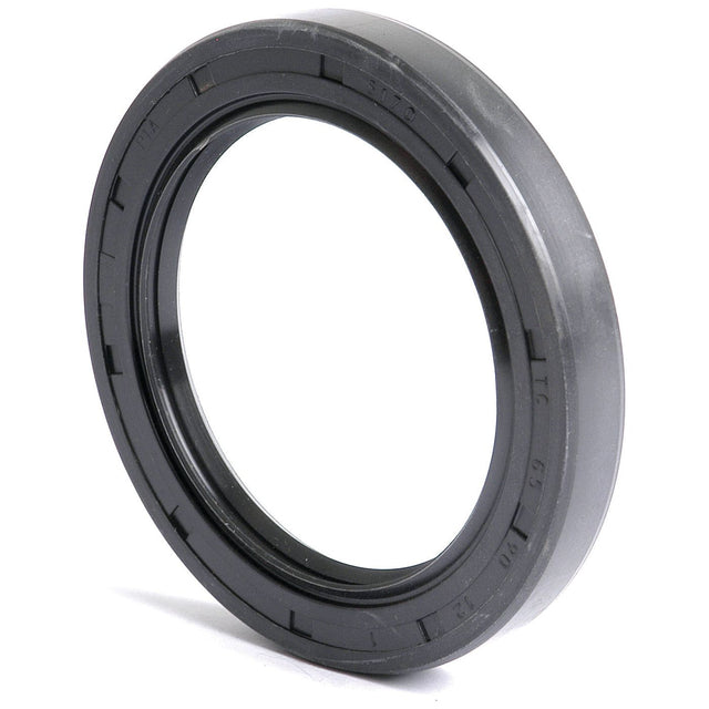 This is a close-up image of a Sparex Metric Rotary Shaft Seal, 65 x 90 x 12mm Double Lip (Sparex Part No. S.50438) in black, featuring ridges along its outer edge.