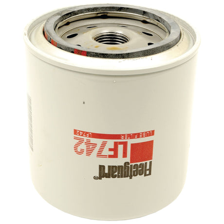 A white Sparex LF742 oil filter (Sparex Part No. S.76257), featuring a black rubber gasket, metal top, and threaded center hole, perfect for International Harvester vehicles.