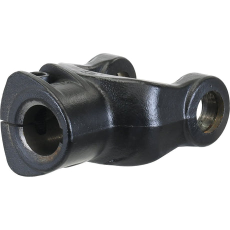 Close-up image of a sleek black metal automotive engine part with cylindrical openings on both ends, reminiscent of the PTO Yoke - Interfering Clamp Bolt (U/J Size: 30.2 x 92mm) Bore Ø35mm, Key Size: 10mm from Sparex, typically featured in Bondioli & Pavesi's PTO Series.
