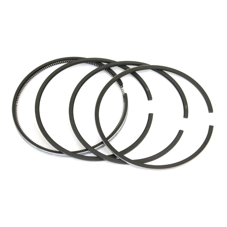 A Sparex Piston Ring set, Part No. S.40426, featuring four black rings of varying sizes from the Massey Ferguson range is arranged side by side against a white background.