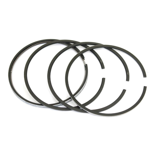A Sparex Piston Ring set, Part No. S.40426, featuring four black rings of varying sizes from the Massey Ferguson range is arranged side by side against a white background.