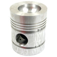 The Sparex Piston (Standard) - S.40409 is a cylindrical metal component with several grooves and a central hole, specifically designed for use in internal combustion engines. The surface features a textured pattern, which enhances the compression height for optimal performance.