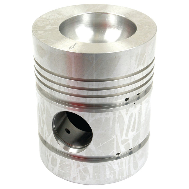 The Sparex Piston (Standard) - S.40409 is a cylindrical metal component with several grooves and a central hole, specifically designed for use in internal combustion engines. The surface features a textured pattern, which enhances the compression height for optimal performance.