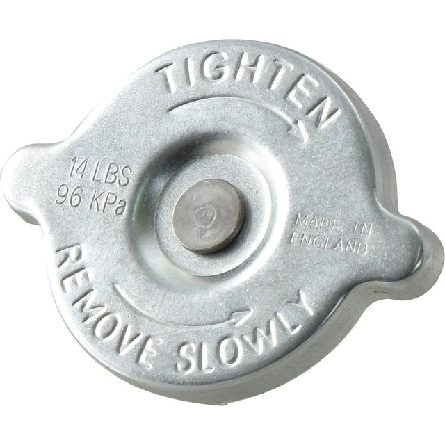 Close-up of the Sparex Radiator Cap - S.140979, a metal cap with engraved instructions: "Tighten" and "Remove Slowly," rated for 14 lbs / 96 kPa pressure. Suitable for various engines and marked with Manufacture Information: "Made in England.