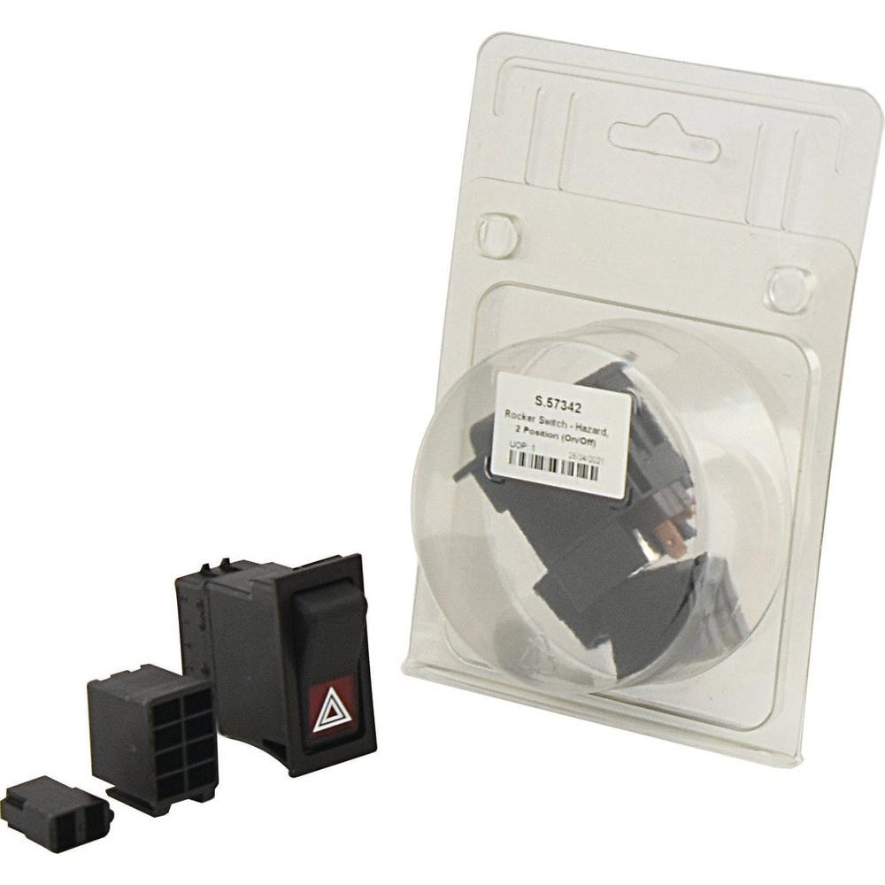 The Rocker Switch - Hazard, 2 Position (On/Off) - S.57342 by Sparex is IP65-rated and designed for 12V DC systems. It features a black body with a red hazard triangle, comes complete with connector ports and a barcode label, and is visible both inside and outside the packaging.
