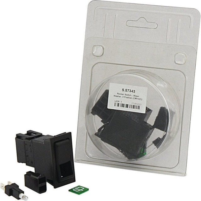 Plastic packaging containing a black IP65 Rocker Switch - Wiper Washer, 3 Position (Off/1/(2)) (S.57343) by Sparex, a green circuit board, and other components. One 12V DC switch and circuit board are displayed outside the packaging.