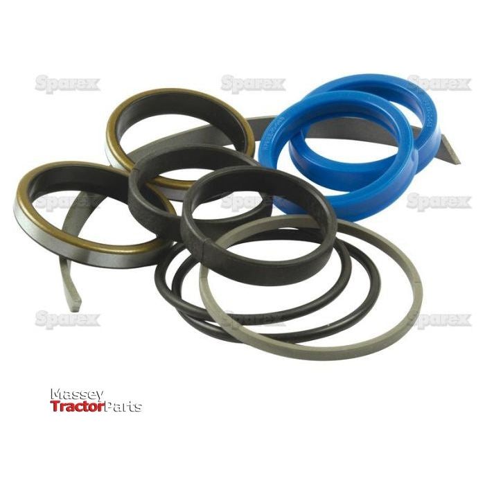 The Seal Kit (Power Steering Cylinder) from Sparex, part no. S.43289, includes assorted black, blue, and brown seals and rings for your Massey Ferguson equipment. Displayed on a white background, the components are neatly organized with the Massey Tractor Parts logo visible in the bottom left corner.