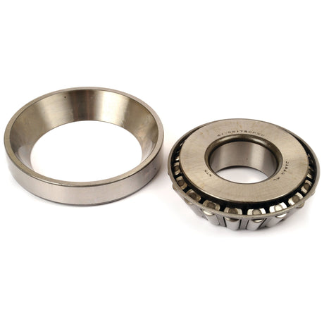 A Sparex Taper Roller Bearing (4T-55175C/55437) - S.68845 and its accompanying outer ring, both crafted from metal, placed side by side on a white background.