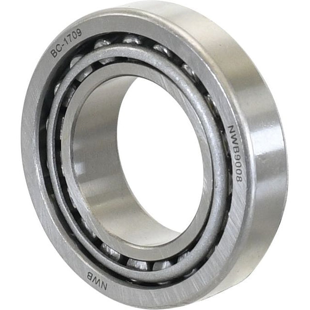 Close-up of a Sparex Taper Roller Bearing (LM501349/501310) - S.4235, engraved with part numbers "BC-1709" and "NWB90008," perfect for Case IH machinery.