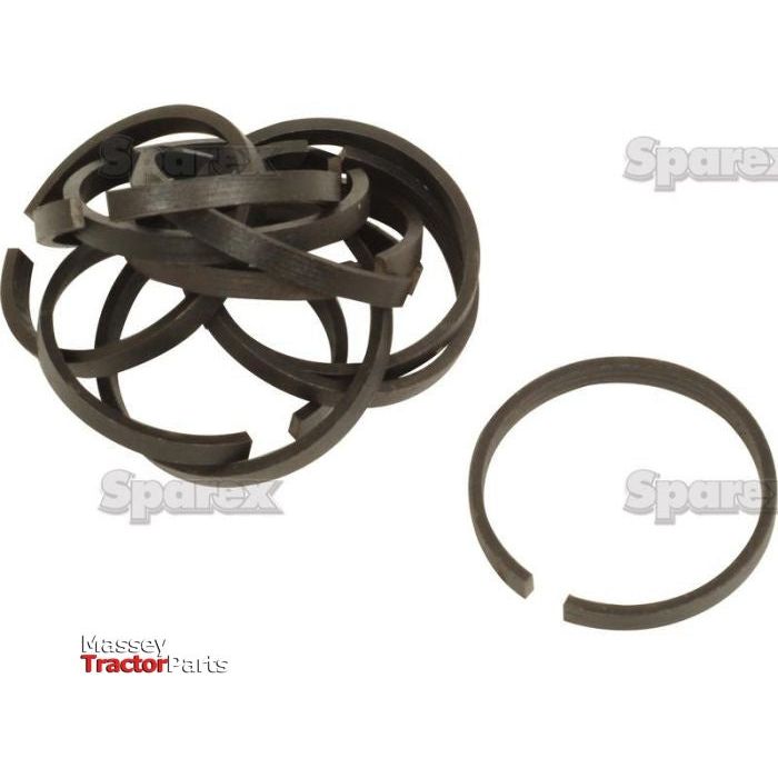 A pile of dark-colored hydraulic piston rings with one separated ring on a white background, labeled "Sparex" across the image and "Massey Tractor Parts" in the bottom left corner. Perfect for Massey Ferguson maintenance needs. Product: Hydraulic Piston Ring | Sparex Part No.S.3353