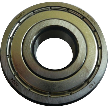 A Spigot Bearing - S.146127 by Sparex with visible engravings "KOREA," "K272-011404HB," "5304," and "TAG." It features an inner circular opening, an outer ring, and has a 20mm OD.