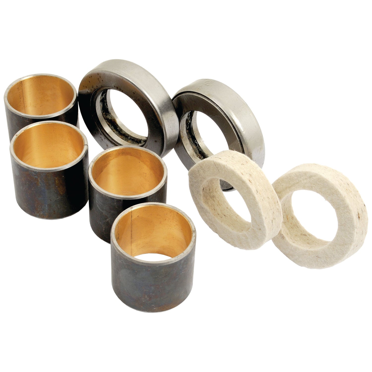 Several cylindrical metal bushings, two metal rings, and two white felt rings are arranged on a white background, resembling parts from the Sparex Spindle Repair Kit | Sparex Part No. S.40219 for a Massey Ferguson tractor.