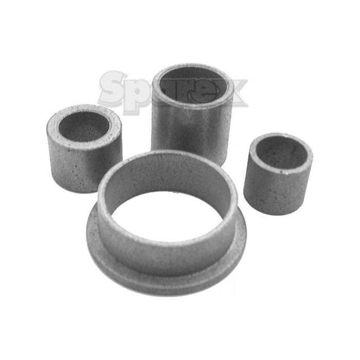 Four variously sized cylindrical metal bushings from the Starter Bush Kit (Sparex Part No. S.66338) by Sparex are arranged on a plain background, perfect for Ford / New Holland machinery.