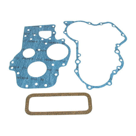 Three different shaped gaskets, including one rectangular gasket and two irregularly shaped gaskets with multiple holes, laid out on a white background—ideal for those requiring precise specifications for their Hinomoto machinery using the Sparex Timing Cover Gasket (Sparex Part No. S.20317).