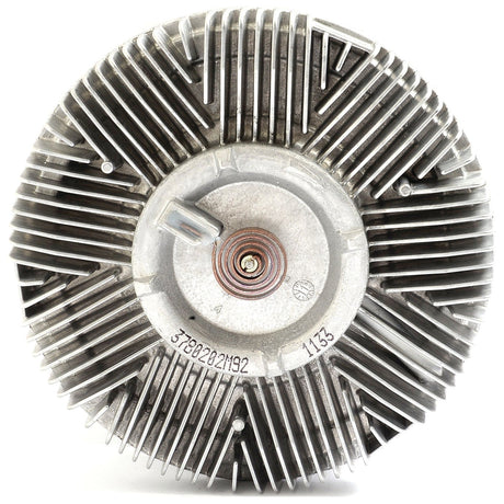 Close-up view of a metallic, circular radiator cooling component with multiple straight fins arranged radially, often identified as the Viscous Fan Drive (Sparex Part No. S.104718) from the Sparex brand, commonly found in Massey Ferguson tractors.