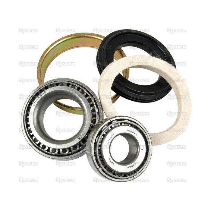 A set of mechanical bearings and seals, including cylindrical metal bearings and circular rubber and felt seals, arranged on a white background. This Sparex Wheel Bearing Kit (Part No. S.14040) is perfect for those in need of reliable replacements for 1094015R92.