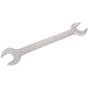 The Draper Elora Long Imperial Double Open End Spanner, 1.5/16 X 1.1/2" - 100A-1.5/16x1.1 from Draper lies on a white background, featuring two different-sized ends and is constructed from chrome vanadium steel, offering excellent corrosion protection while adhering to DIN 3110 standards.