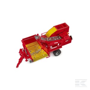 The Bruder Grimme potato digger - U02130 is a 1:16 scale model of agricultural machinery, featuring a red and yellow design with a conveyor belt and sorting area. Designed to be towed on two wheels, this plastic toy is an excellent addition for young farming enthusiasts.