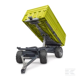 The Fliegl tipping trailer - U02203 by Farming Parts features a green, tilted cargo bed designed for easy unloading, with four large off-road tires and a sturdy metal frame, making it ideal for agricultural tasks.