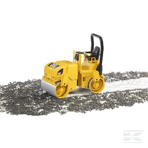 A yellow 1:16 scale CAT Road-roller - U02433 by Bruder compacts gravel on a white surface, smoothing it as part of the construction process.