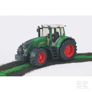 A Bruder Fendt 936 Vario - U03040 tractor, featuring large red wheels, is driving on a path covered in green material, showcasing the pinnacle of agricultural machinery.