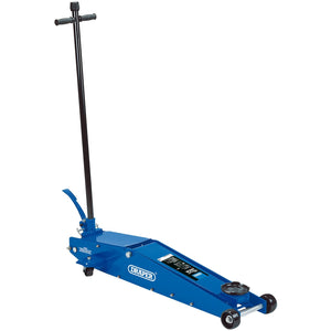 The Draper Long Chassis Trolley Jack, 2 Tonne - TJ2LR, features the branding "Draper" on the side. This blue hydraulic floor jack comes with a long handle and four wheels, is equipped with a safety valve and a heavy-duty chassis, and boasts a quick-lift foot pedal for efficient operation.