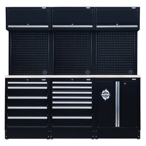 Introducing the Draper Bunker® Modular Storage Combo With Stainless Steel Worktop (14 Piece) - MS400COMBO/14B by Draper. This stylish and durable unit, crafted from premium-quality steel with a matt black finish, features three upper cabinets, two large pegboards, and three lower cabinets equipped with multiple drawers and a cupboard.