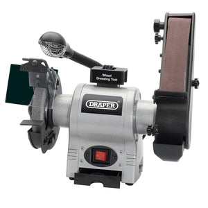 Introducing the Draper Bench Grinder With Sanding Belt And Worklight, 150mm, 370W - GD650A: a versatile workshop machine from Draper that comes equipped with a mounted grinding wheel and sanding belt. It includes a wheel dressing tool and an adjustable lamp for detailed work.