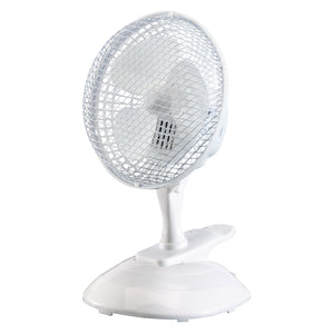 The Draper 230V Clip-On Desk Fan, 6"/150mm, 15W - FAN1B, a small-sized table fan with a white finish and a protective metal grill, is turned slightly to the right. This Draper desk fan features a tiltable head and a two-speed motor but is currently switched off.