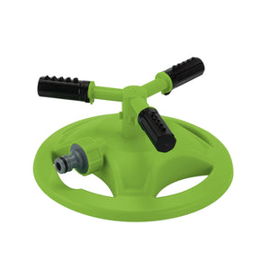 A Draper Adjustable Revolving 3-Arm Sprinkler - 3-ARS1, which is green and circular with three adjustable black nozzles for water distribution and garden hose connector fittings, sits on a white background.