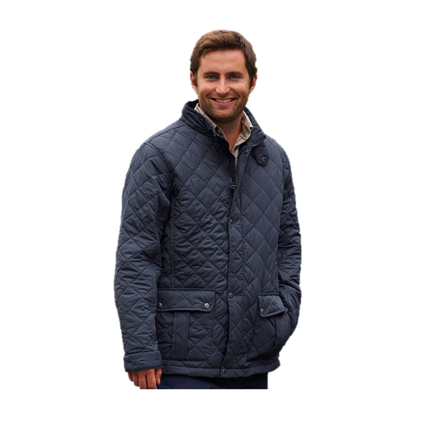 A man wearing a Cottonmount Champion Padstow Quilted Jacket Navy with side entry pockets stands and smiles while looking at the camera on a white background.