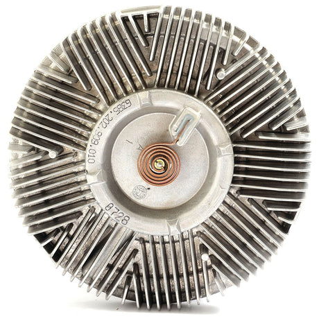 Close-up view of the Sparex NLA Viscous Fan Drive (Sparex Part No. S.104715) with radial fins and a central attachment point, showing details of its design and wear, along with 6 bolt holes for secure attachment.