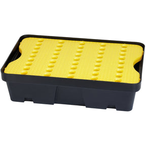The Draper Spill Drip Tray, 20L - PDT20 is a durable black plastic container with a yellow perforated lid, made from heavy-duty HDPE for durability. It is stackable and helps to protect the workplace.